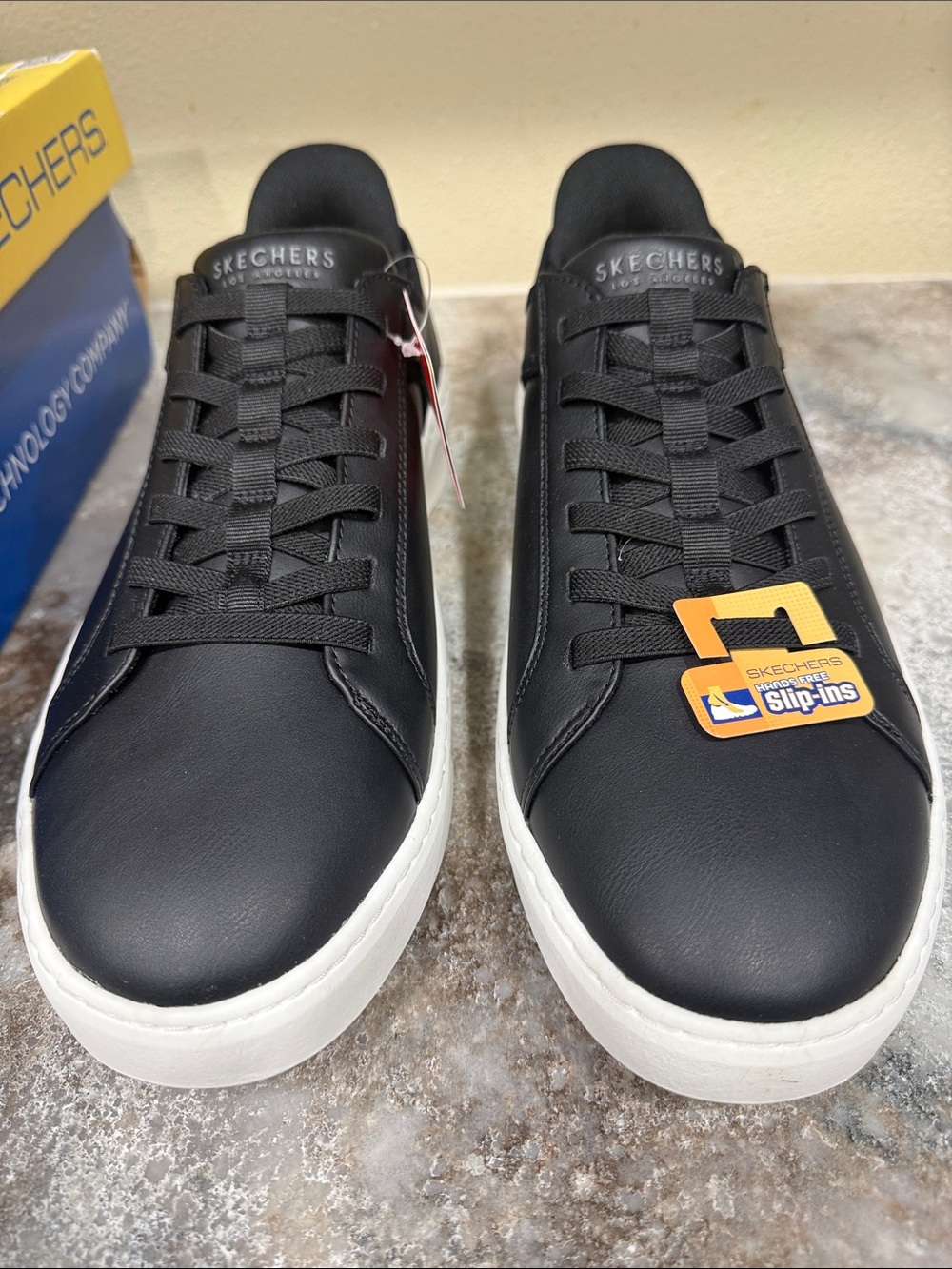 Skechers Men's Black Sneakers with White Platform Sole